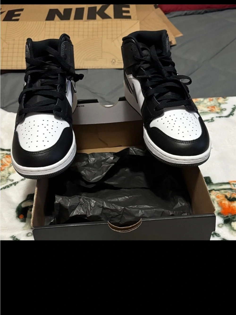 Jordan 1 Mid Men’s Black, gray and White High-Top Sneakers